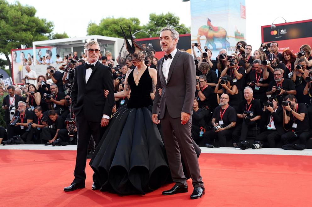 PHOTO: Joaquin Phoenix, Lady Gaga and director Todd Phillips attend the "Joker: Folie Ã  Deux" red carpet during the 81st Venice International Film Festival at Sala Grande on Sept. 4, 2024, in Venice, Italy.