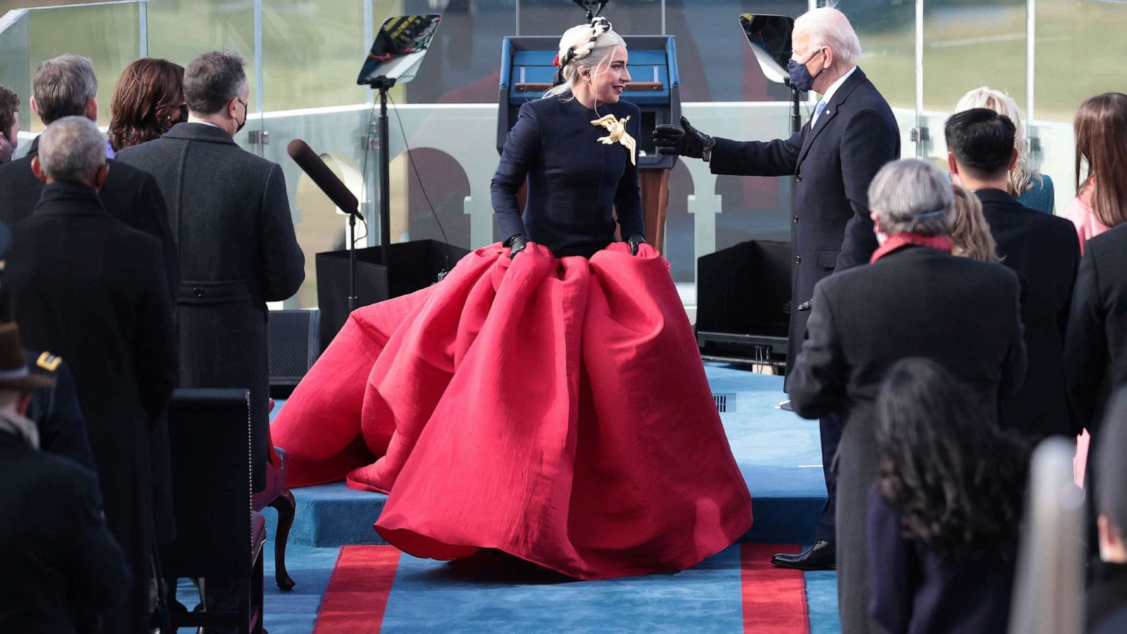 PHOTO: Lady Gaga talks with President-elect Joe Biden during the inauguration on the West Front of the U.S. Capitol on Jan. 20, 2021, in Washington, D.C.