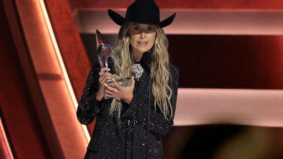 PHOTO: Lainey Wilson accepts the Female Vocalist of the Year Award onstage during The 58th Annual CMA Awards, Nov. 20, 2024, in Nashville, Tenn.