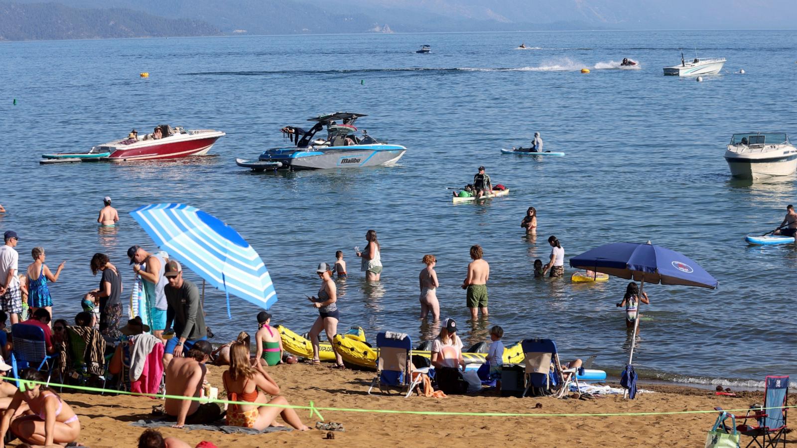 PHOTO: Beachgoers and boaters spend time at Kings Beach in Kings Beach, Calif., June 30, 2023.