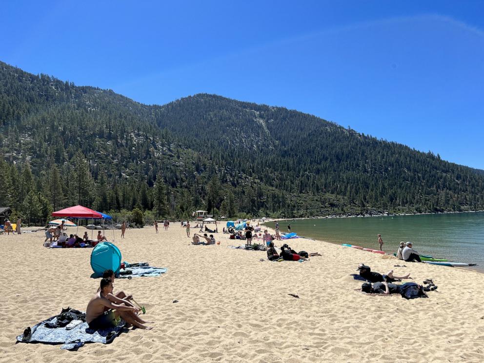 PHOTO: Beach tents and people are visible on Main Beach at Sand Harbor, Lake Tahoe Nevada State Park, Incline Village, Nevada, June 14, 2022.