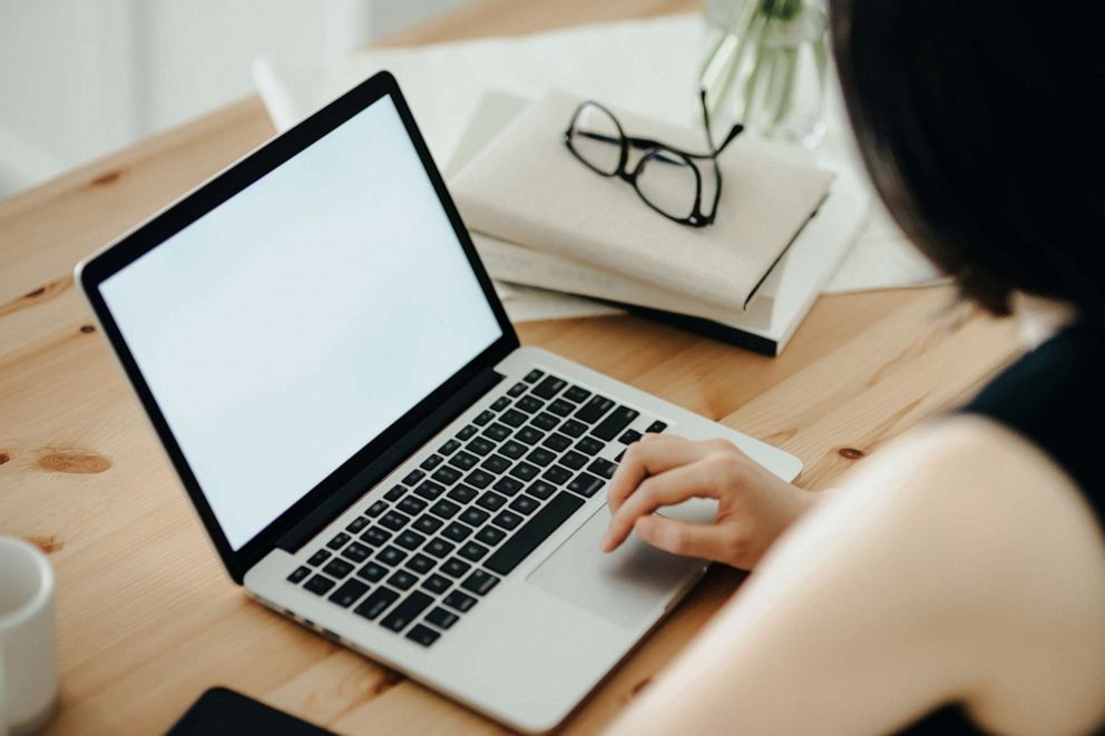 PHOTO: A woman works on a laptop in this stock photo.