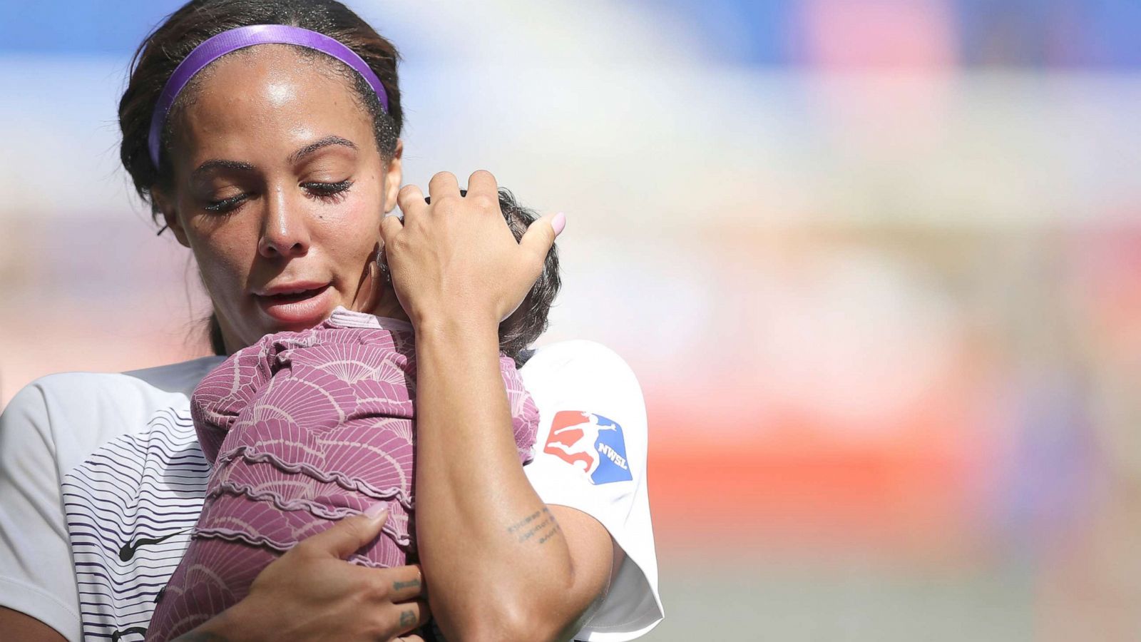 PHOTO: Orlando Pride forward Sydney Leroux (2) holds her child after a soccer match against Sky Blue FC, Sept. 29, 2019, in Harrison, N.J.