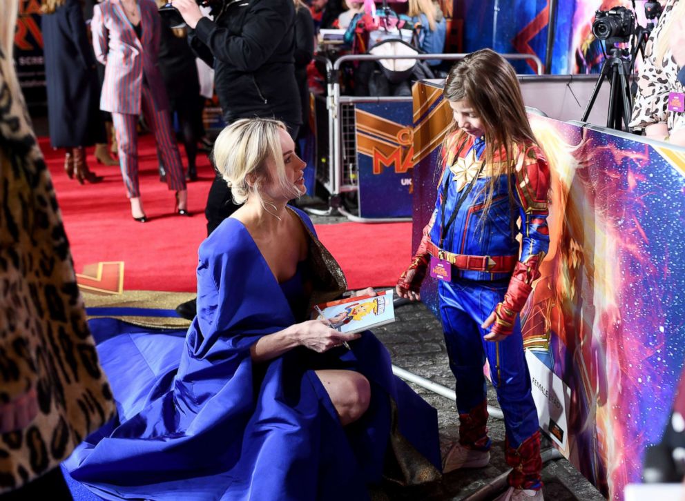 PHOTO: Brie Larson signs an autograph for a fan at the UK Gala Screening of Marvel Studios' "Captain Marvel," Feb. 27, 2019 in London.