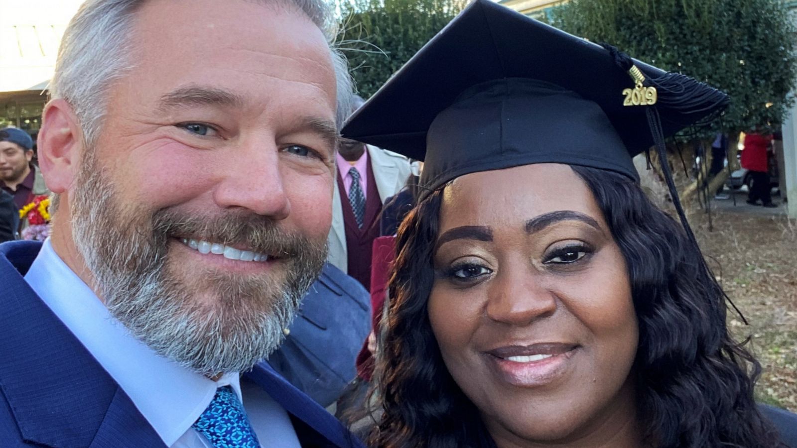 PHOTO: Latonya Young and Kevin Esch pose at Young's December 2019 graduation ceremony at Georgia State University.