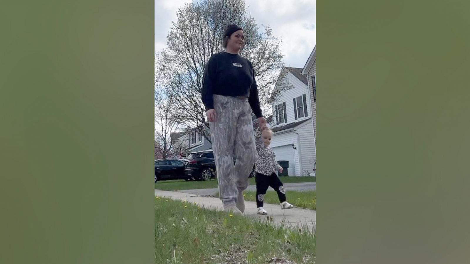 PHOTO: Leah Weiher, 24, walks alongside her 1-year-old daughter Laken.