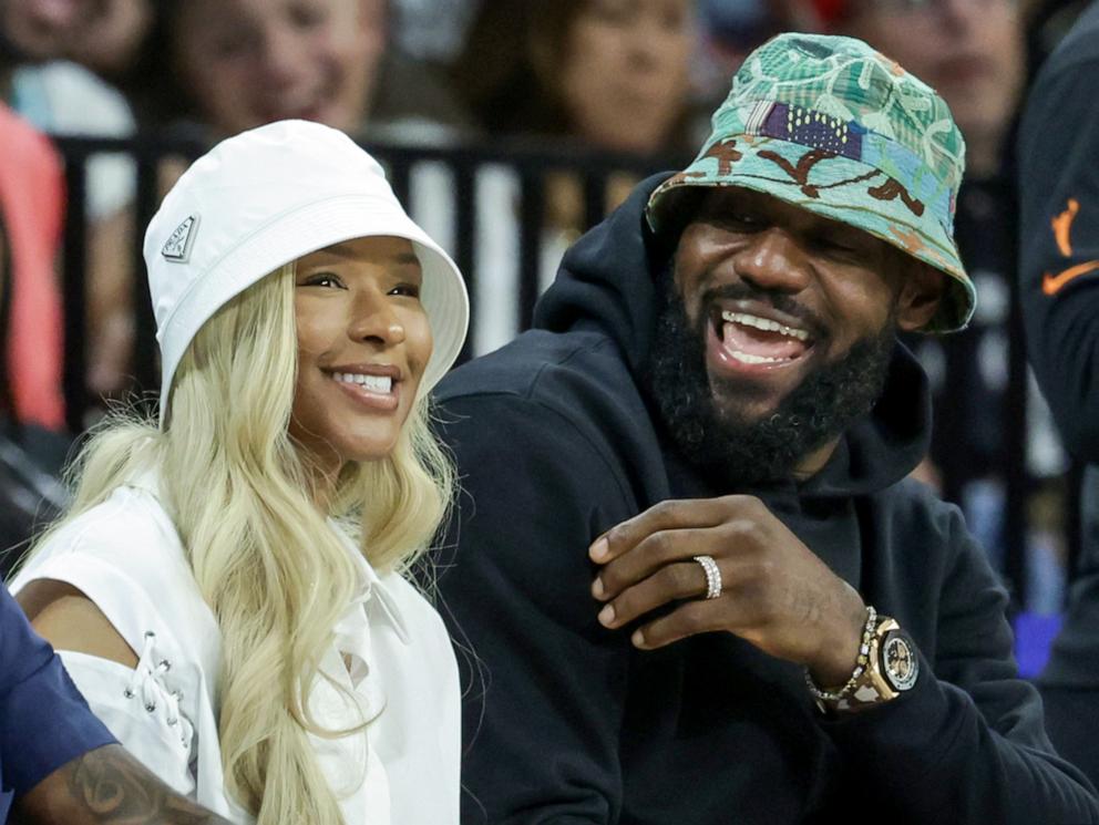 PHOTO: Savannah James and NBA player LeBron James of the Los Angeles Lakers attend a game between the New York Liberty and the Las Vegas Aces, June 15, 2024, in Las Vegas.