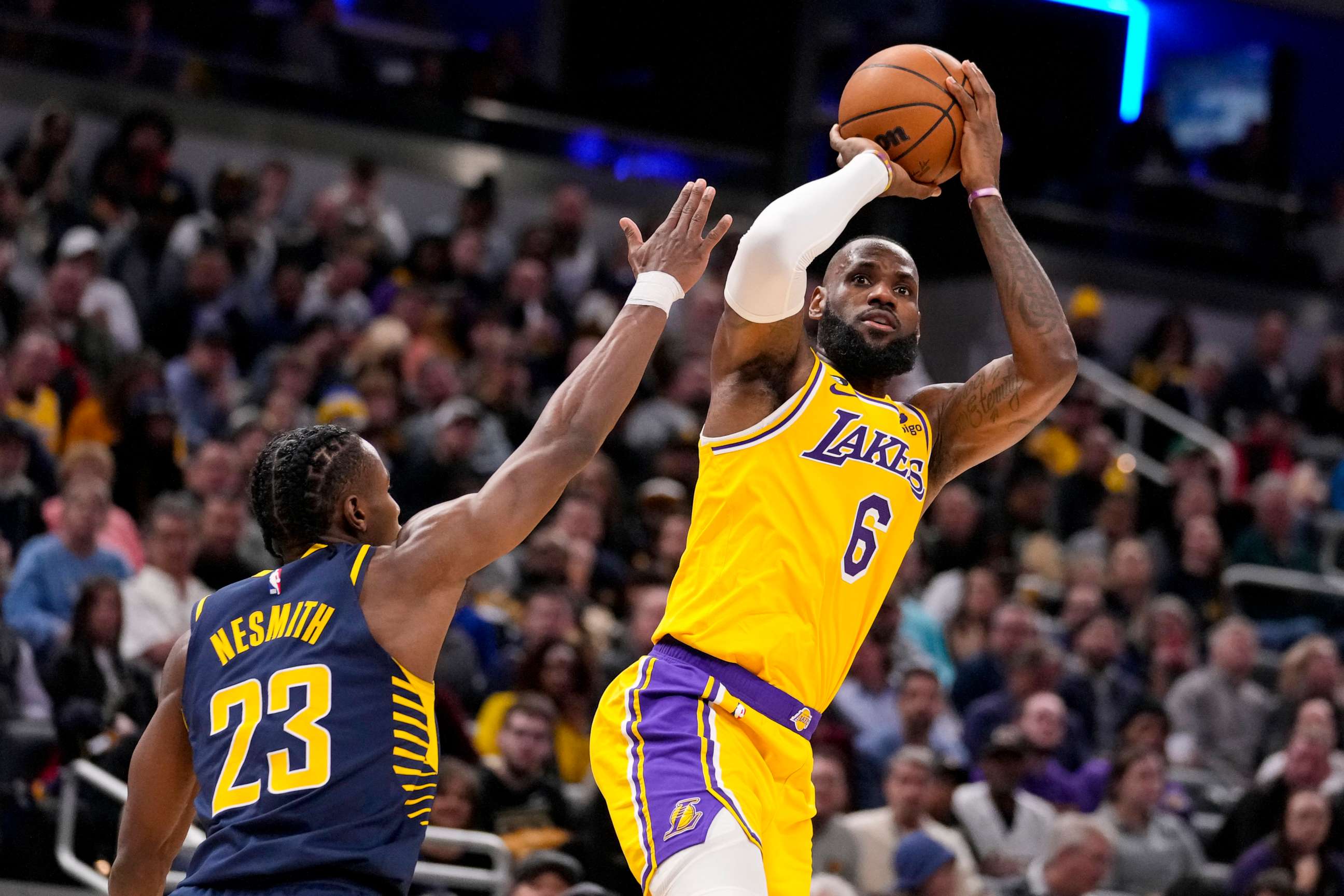 PHOTO: Los Angeles Lakers forward LeBron James (6) shoots over Indiana Pacers forward Aaron Nesmith (23) during the first half of an NBA basketball game in Indianapolis, Feb. 2, 2023.