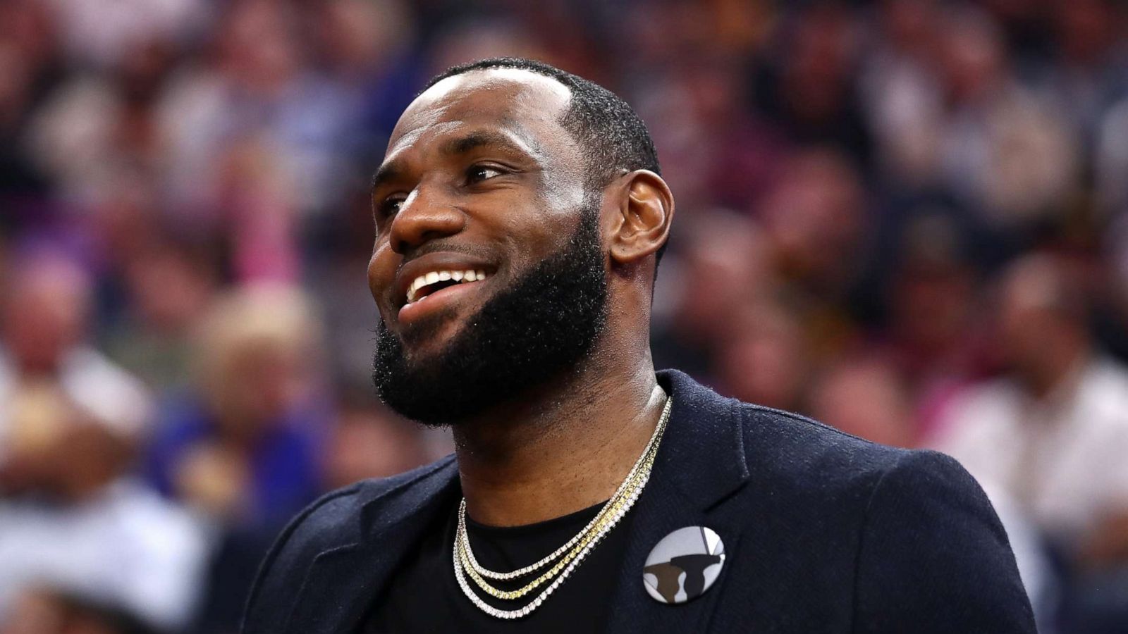 PHOTO: LeBron James of the Los Angeles Lakers sits on the bench during a game against the Golden State Warriors at Chase Center on Feb. 27, 2020, in San Francisco.