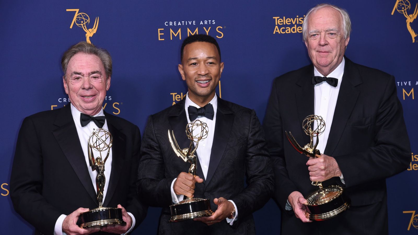 Andrew Lloyd Webber, left, John Legend, and Tim Rice winners of the award for outstanding variety special for "Jesus Christ Superstar Live in Concert" poses in the Creative Arts Emmy Awards at The Microsoft Theater on Sunday, Sept. 9, 2018.