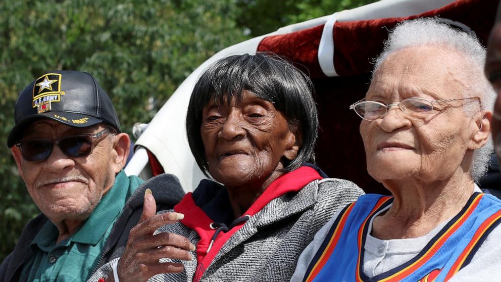 PHOTO: Hughes Van Ellis, 100, Lessie Benningfield Randle, 106, also known as Mother Randle, and Viola Fletcher, 107, survivors of the Tulsa Race Massacre, attend the Black Wall Street Legacy Festival 2021 in Tulsa, Okla., May 28, 2021.