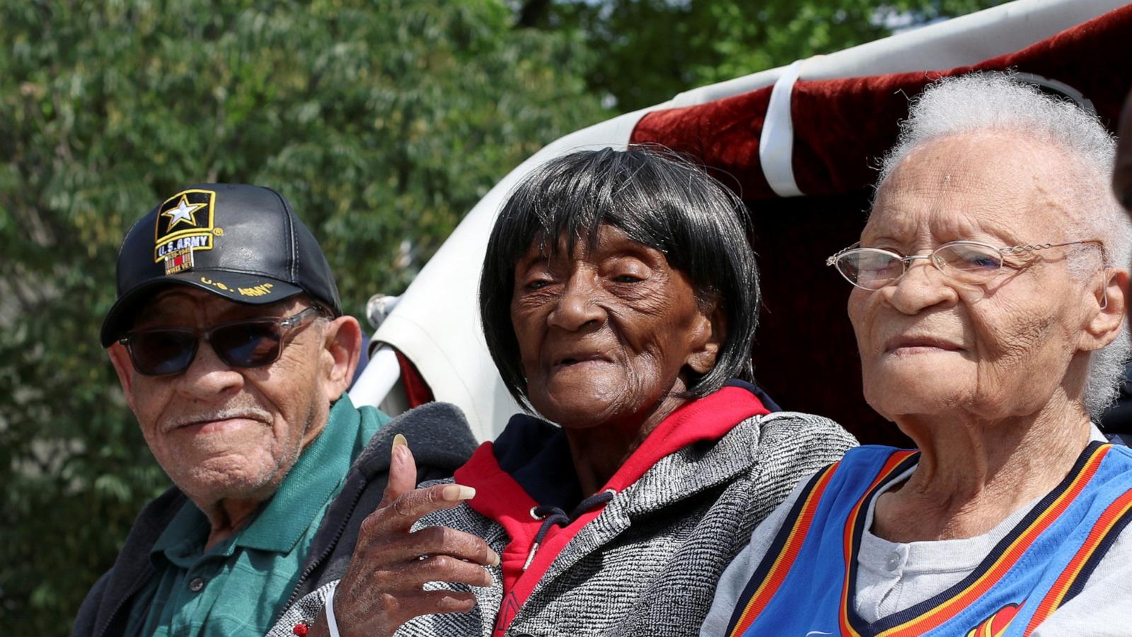 PHOTO: Hughes Van Ellis, 100, Lessie Benningfield Randle, 106, also known as Mother Randle, and Viola Fletcher, 107, survivors of the Tulsa Race Massacre, attend the Black Wall Street Legacy Festival 2021 in Tulsa, Okla., May 28, 2021.