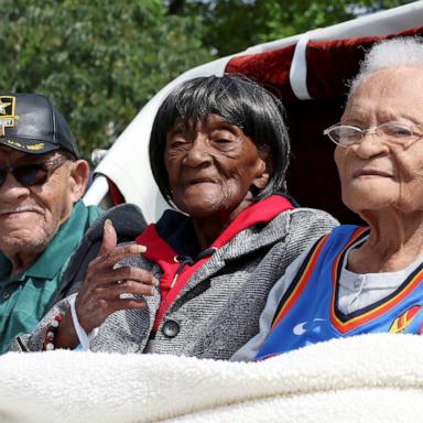 PHOTO: Hughes Van Ellis, 100, Lessie Benningfield Randle, 106, also known as Mother Randle, and Viola Fletcher, 107, survivors of the Tulsa Race Massacre, attend the Black Wall Street Legacy Festival 2021 in Tulsa, Okla., May 28, 2021.