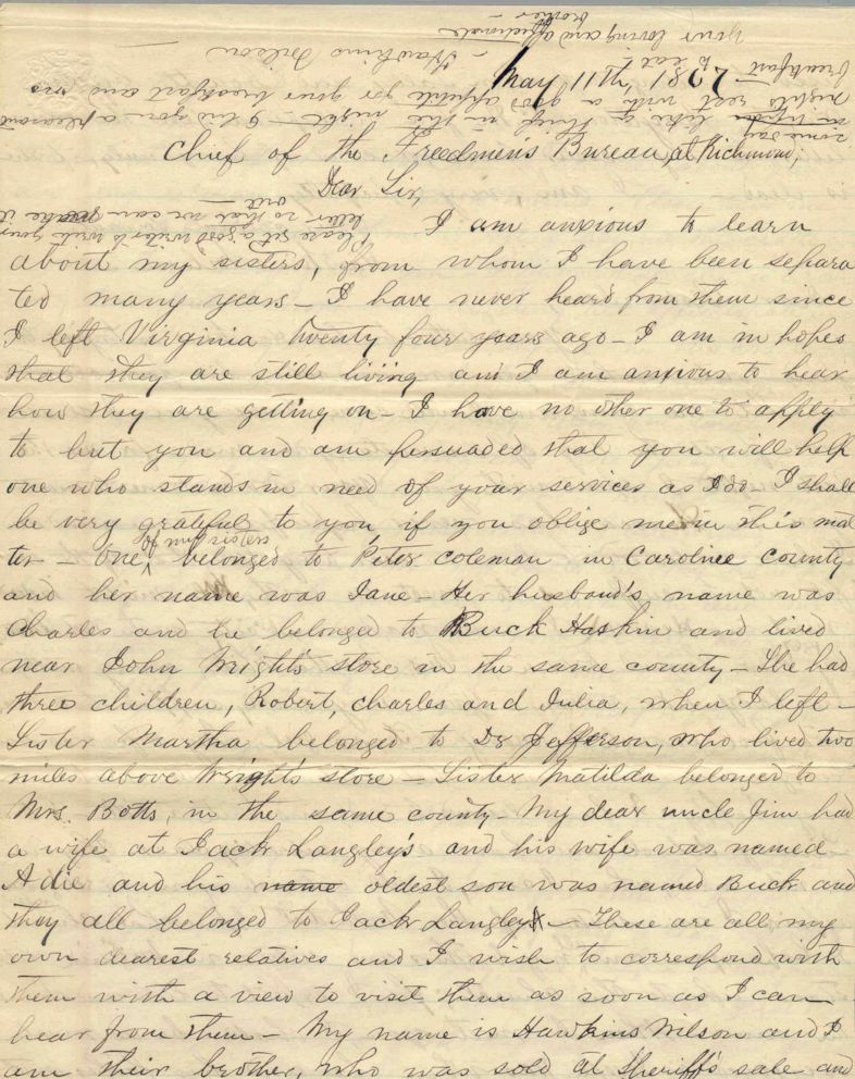 PHOTO: Hawkins Wilson writes a letter to the chief of the Freedman's bureau in search of his family after they were separately during slavery, May 11, 1867.