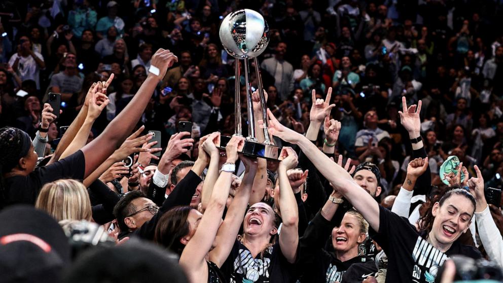 PHOTO: The New York Liberty celebrate after winning the 2024 WNBA Finals at Barclays Center on Oct. 20, 2024 in Brooklyn.