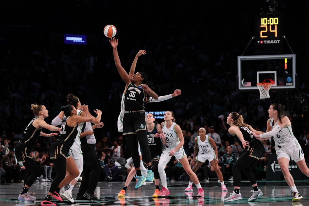 PHOTO: Jonquel Jones #35 of the New York Liberty jumps for the tipoff ball against the Minnesota Lynx during Game Five of the WNBA Finals at Barclays Center on Oct. 20, 2024 in Brooklyn.