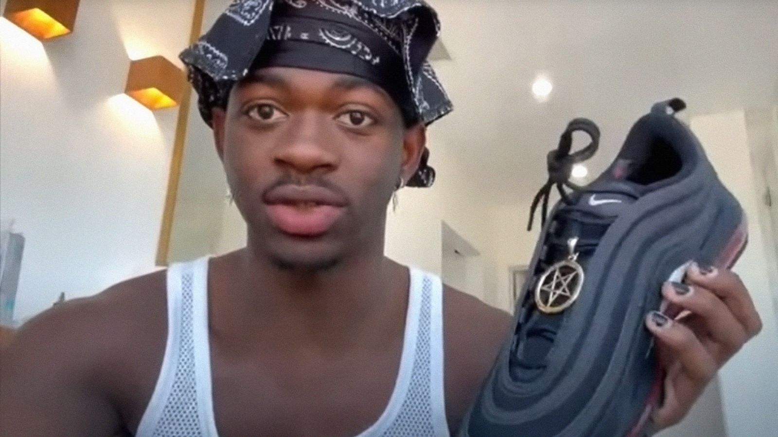 Nike sues maker of Lil Nas X 'Satan shoes' containing drop of human blood -  Good Morning America