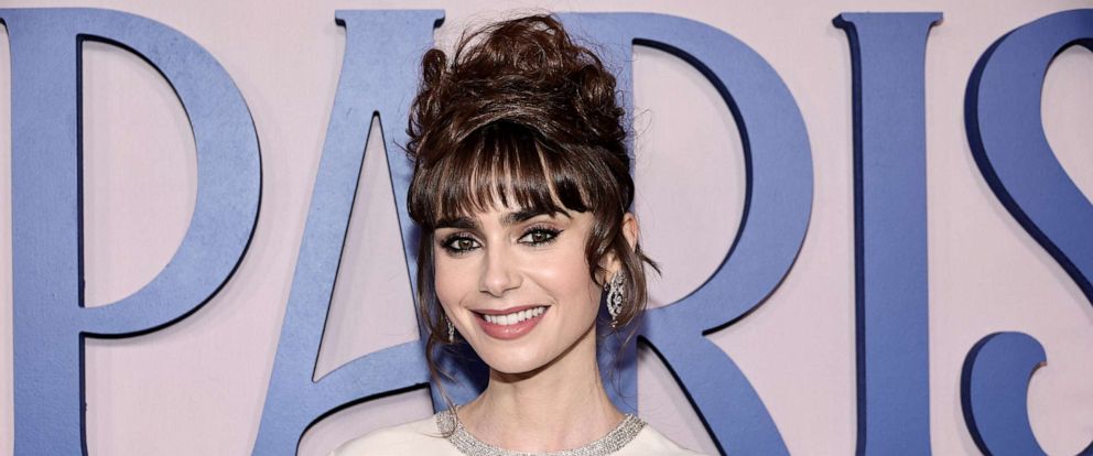 PHOTO: Lily Collins attends the Emily In Paris French Consulate Red Carpet at French Consulate, Dec.15, 2022, in New York City.