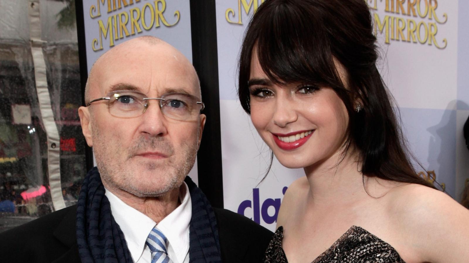 PHOTO: Musician Phil Collins (L) and actress Lily Collins arrive at Relativity Media's "Mirror Mirror" Los Angeles premiere at Grauman's Chinese Theatre on March 17, 2012 in Hollywood, Calif.