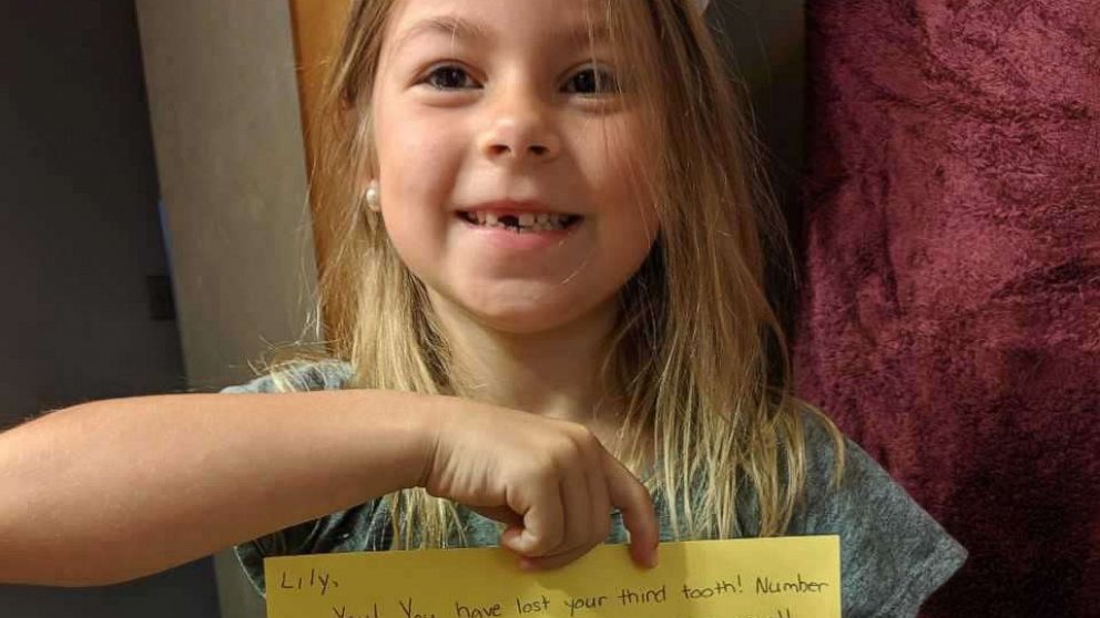 PHOTO: Lily Sciulli, 7, a first grade student at Burchfield Elementary School in Shaler Township, Pa., is shown in this undated photo holding a reply note signed by the tooth fairy.