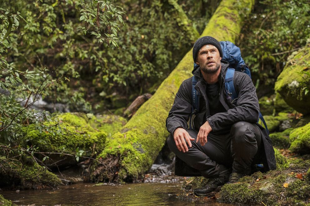 PHOTO: Chris Hemsworth crouches by the edge of a pond on a hike in Episode 5 of "Limitless with Chris Hemsworth".
