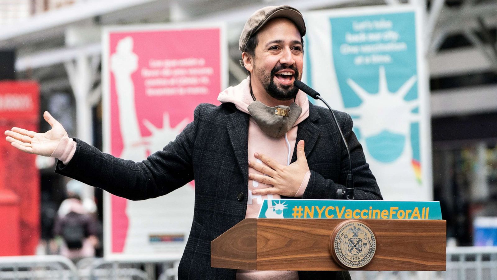 PHOTO: Actor Lin-Manuel Miranda speaks at the opening of the Broadway vaccination site amid coronavirus disease (COVID-19) pandemic in New York City, April 12, 2021.