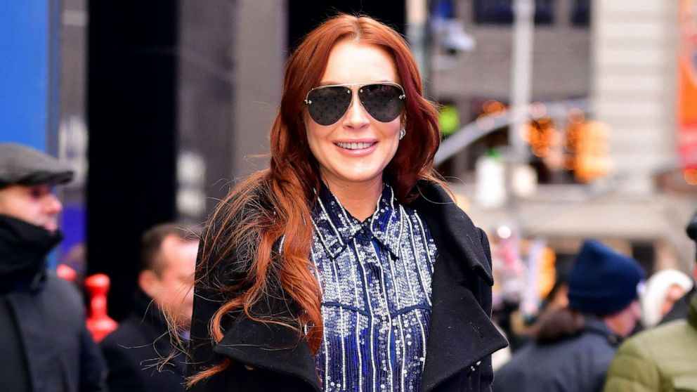 Lindsay Lohan reveals she loves her red hair and 'beautiful freckles' in  sweet Instagram post - Good Morning America