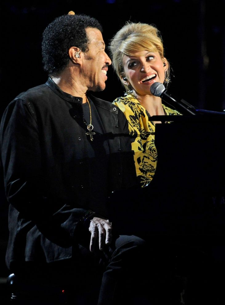 PHOTO: Musician Lionel Richie and his daughter Nicole Richie perform onstage during Lionel Richie and Friends in Concert at the MGM Grand Garden Arena, April 2, 2012, in Las Vegas.
