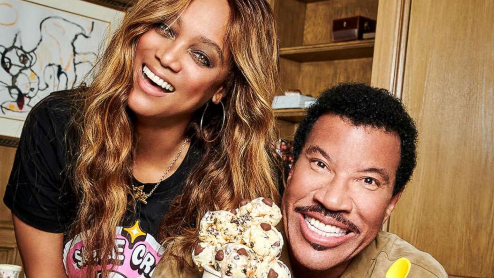 PHOTO: Tyra Banks and Lionel Richie pose with their new limited-edition SMiZE Cream flavor All Night Love.