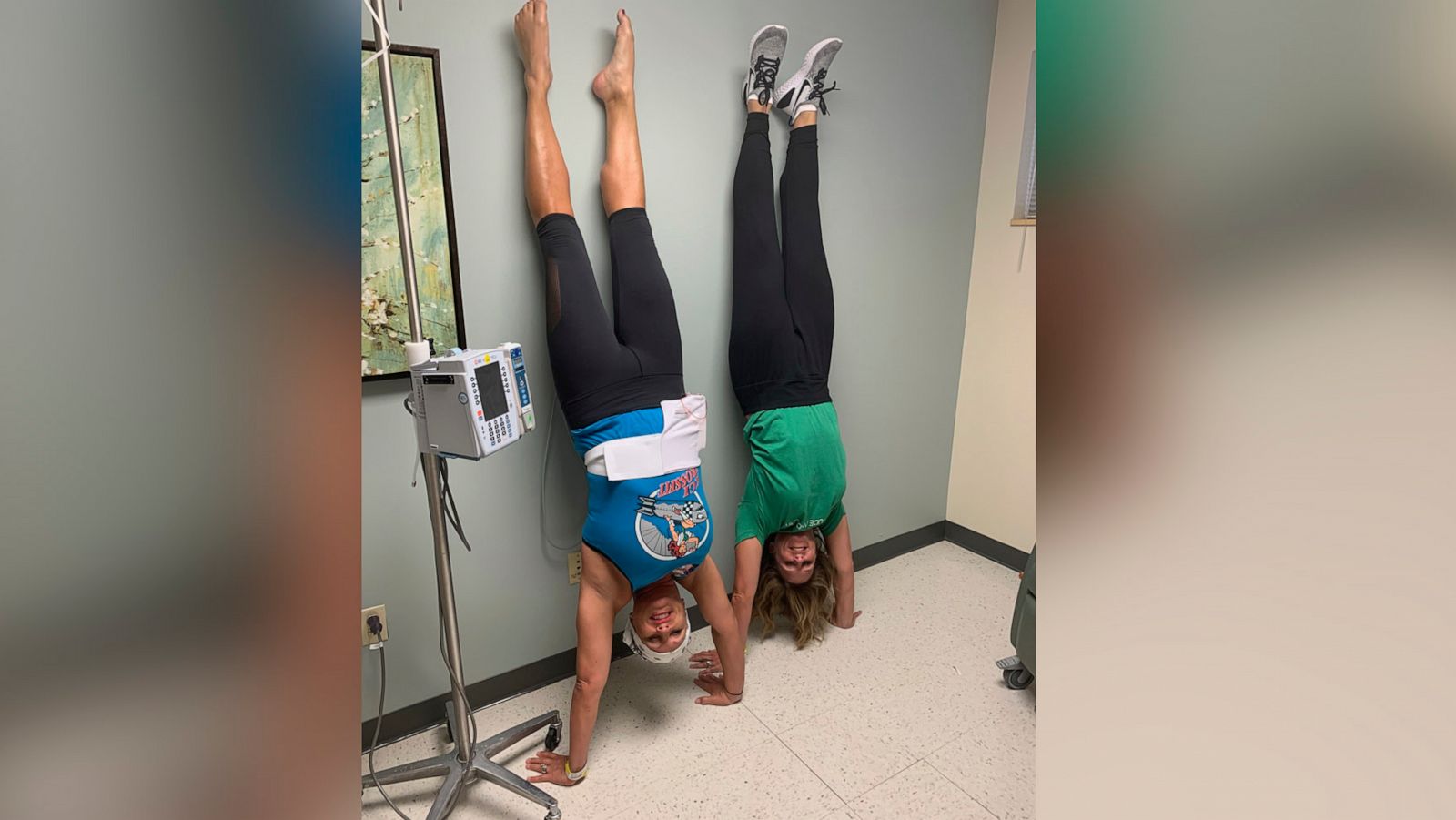 PHOTO: Lisa Fosnough, left, does a handstand with a friend during her chemotherapy treatment.