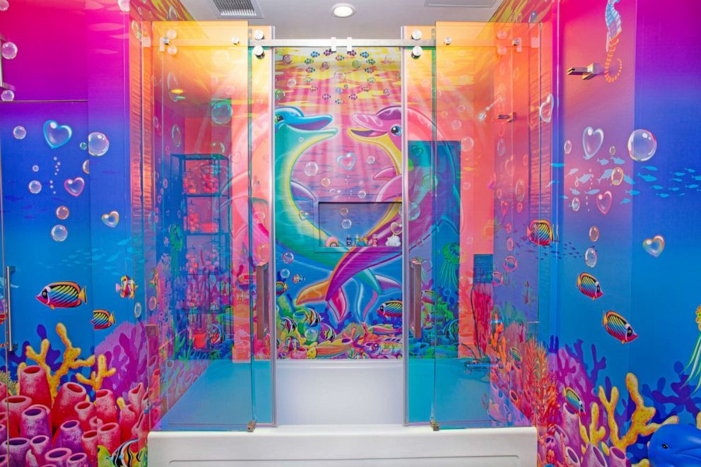 PHOTO: Guests can shower in a bathroom covered in the classic Lisa Frank dolphins.