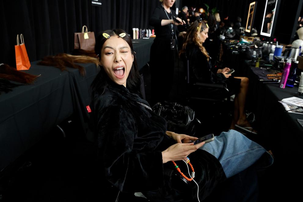 PHOTO: Liu Wen in hair and makeup backstage for the 2024 Victoria's Secret Fashion Show at Duggal Greenhouse on Oct. 15, 2024, in Brooklyn, New York. 