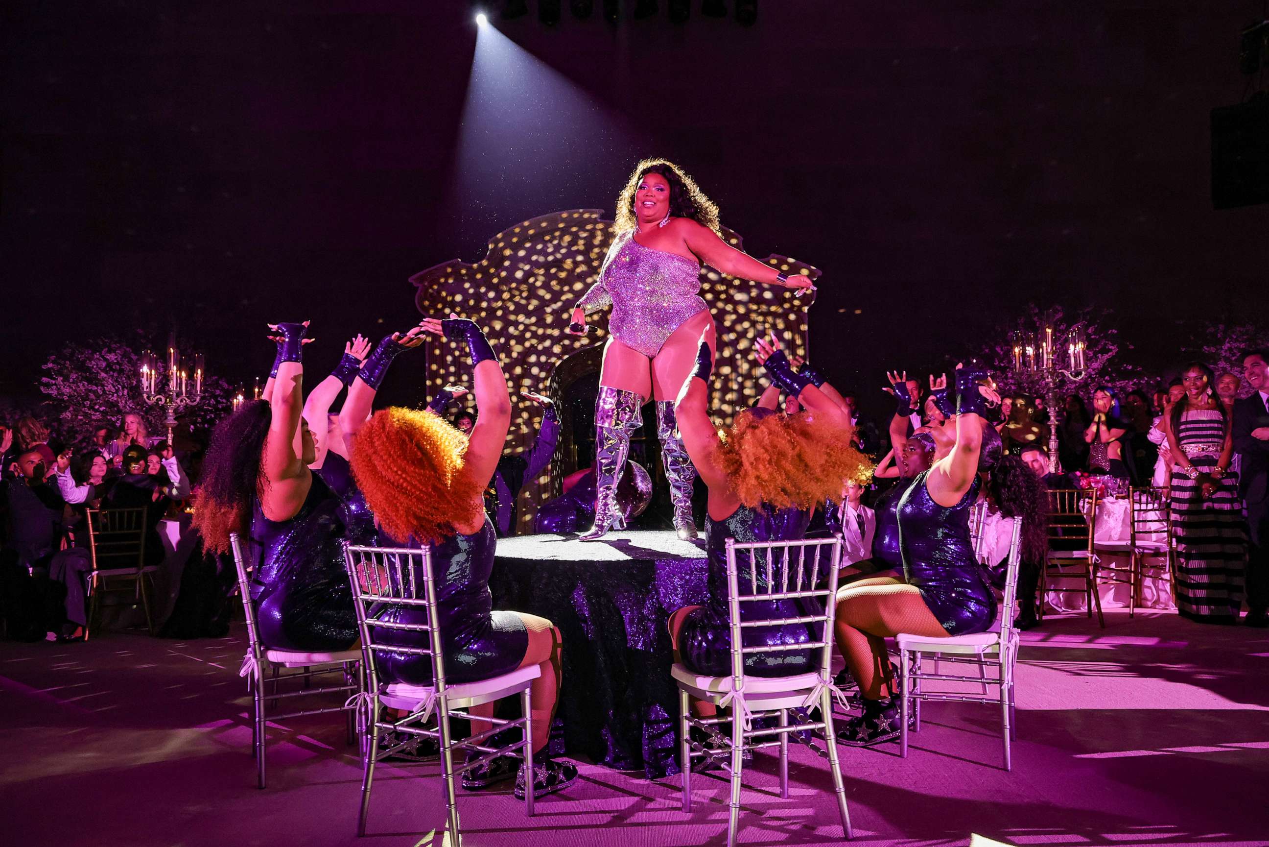 PHOTO: Lizzo performs on a table during The 2023 Met Gala Celebrating "Karl Lagerfeld: A Line Of Beauty" at Metropolitan Museum of Art, May 1, 2023, in New York.
