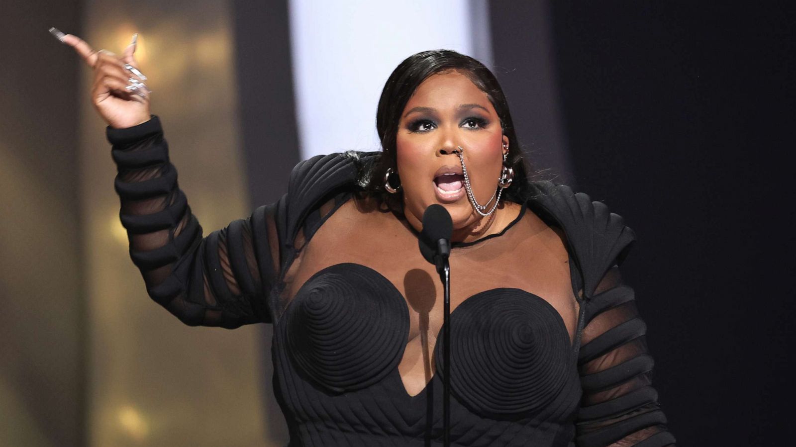 Love, Lizzo” Tells the Superstar's Story, Her Way - INTO