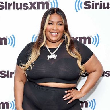 PICS: Lizzo shows off her Yitty denim set with jumpsuit and cropped jacket