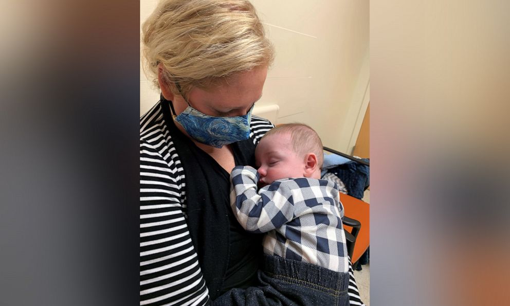 PHOTO: Logan is pictured resting with his mother Sara. 5-month-old Logan developed hair tourniquet syndrome in January and had to be rushed to the ER.