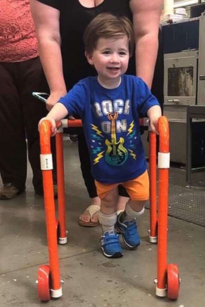 PHOTO: Home Depot employees in Cedartown, Ga., built a walker out of PVC piping for Logan Moore, 2, on May 22, 2019.