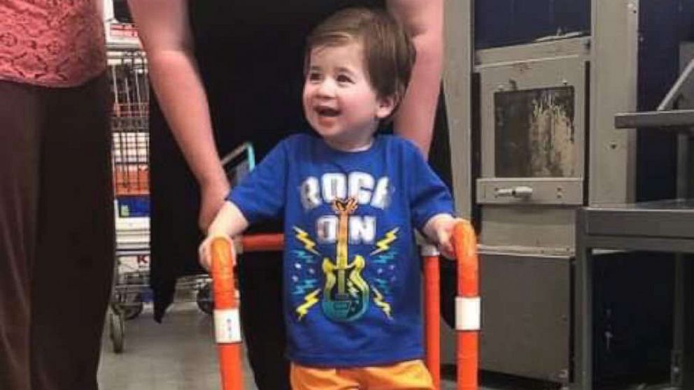 PHOTO: Logan Moore, 2, has hypotonia which affects muscle tone and stability -- making it challenging for him to walk on his own.