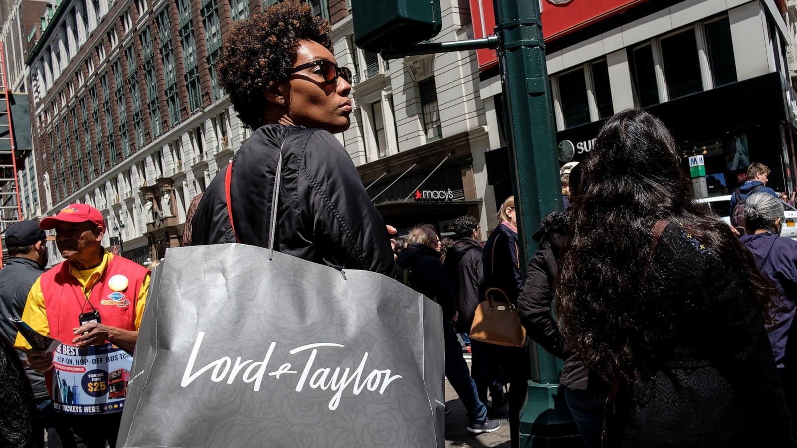 PHOTO: A woman carries a Lord & Taylor shopping bag in the Herald Square neighborhood in New York City, May 12, 2017.