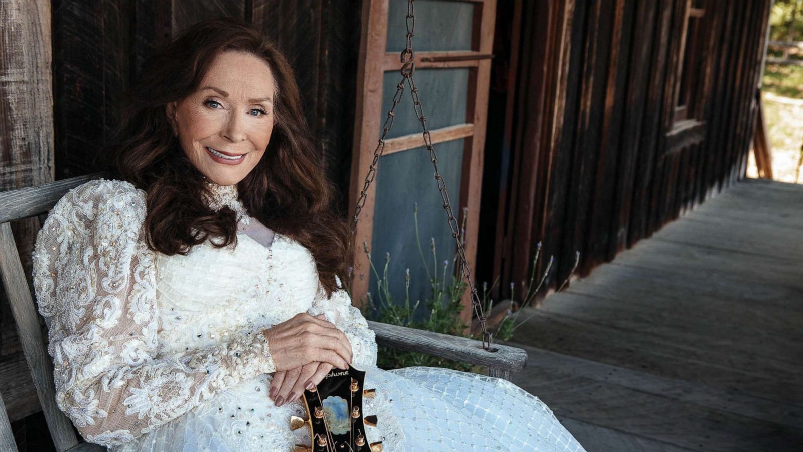 PHOTO: Country music legend Loretta Lynn poses with her guitar in an undated portrait.