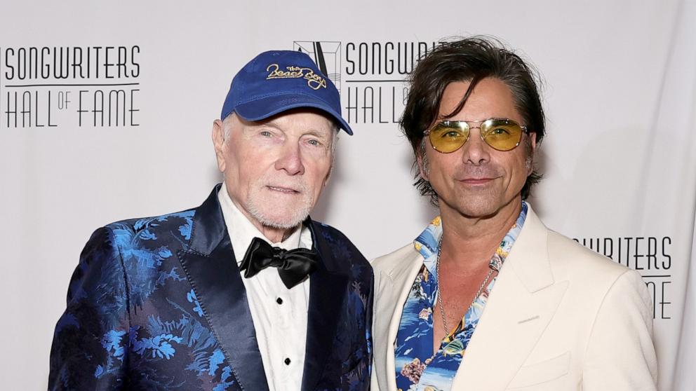 PHOTO: Mike Love and John Stamos attend the 2025 Songwriters Hall Of Fame Induction Ceremony at Marriott Marquis Times Square, June 12, 2025, in New York.