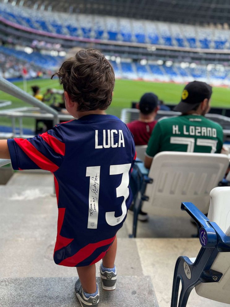 PHOTO: After noticing Luca's cheering, soccer star Alex Morgan couldn't resist surprising him with a special gift - a signed jersey!