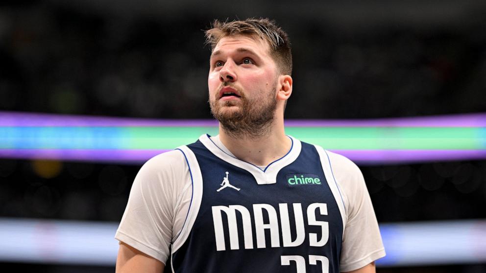 PHOTO: Dallas Mavericks guard Luka Doncic checks the scoreboard during the second half against the Portland Trail Blazers at the American Airlines Center in Dallas, Tex., Dec. 23, 2024.