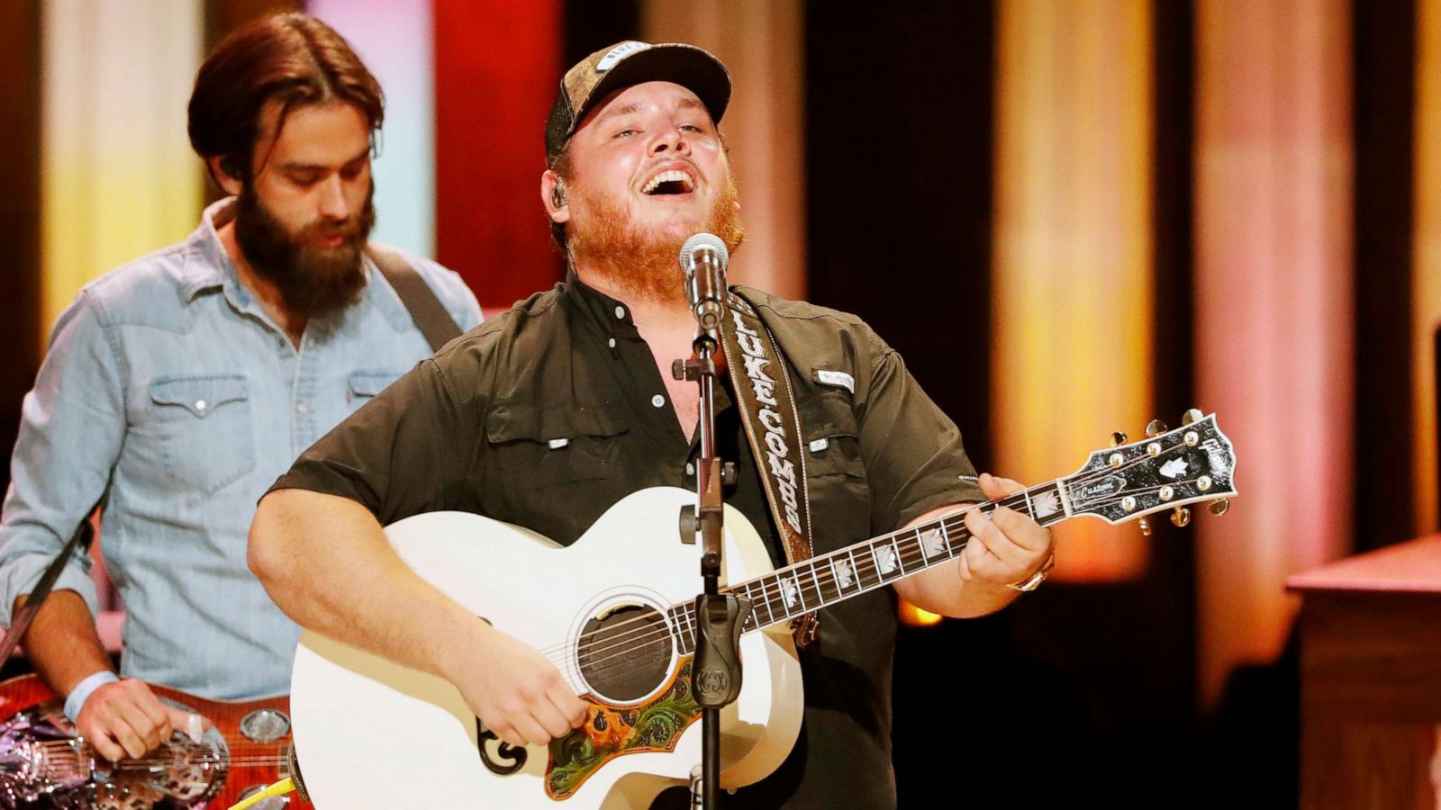 PHOTO: Luke Combs performs at "Luke Combs Joins the Grand Ole Opry Family," at the Grand Ole Opry, July 16, 2019, in Nashville, Tenn.