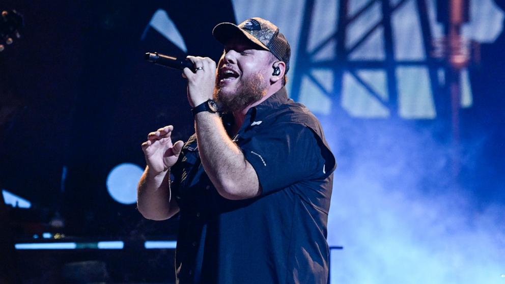 PHOTO: Luke Combs perform onstage during The 58th Annual CMA Awards at Bridgestone Arena on Nov. 20, 2024 in Nashville.