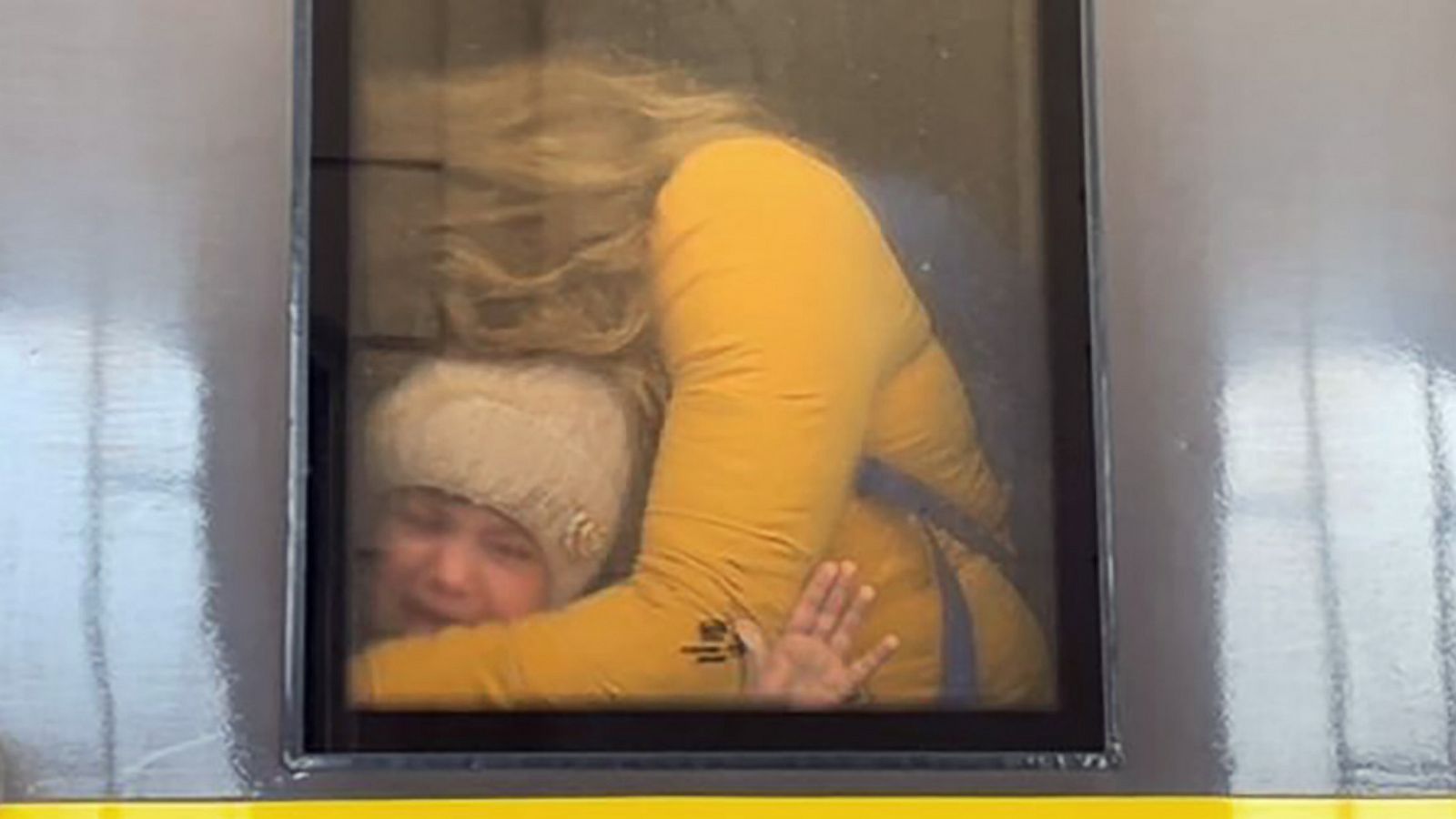 PHOTO: A mother holds her sobbing child after boarding a train in Lviv, Ukraine, Feb. 28, 2022.