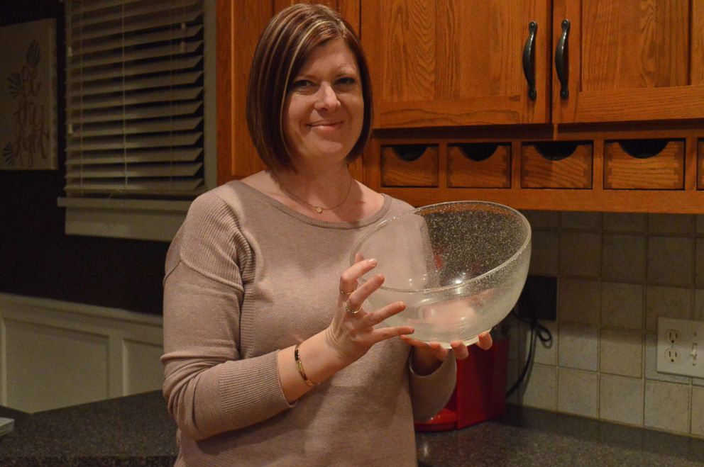 PHOTO:  Lynne Hilton, of Nebraska, holds a bowl she plans to donate.