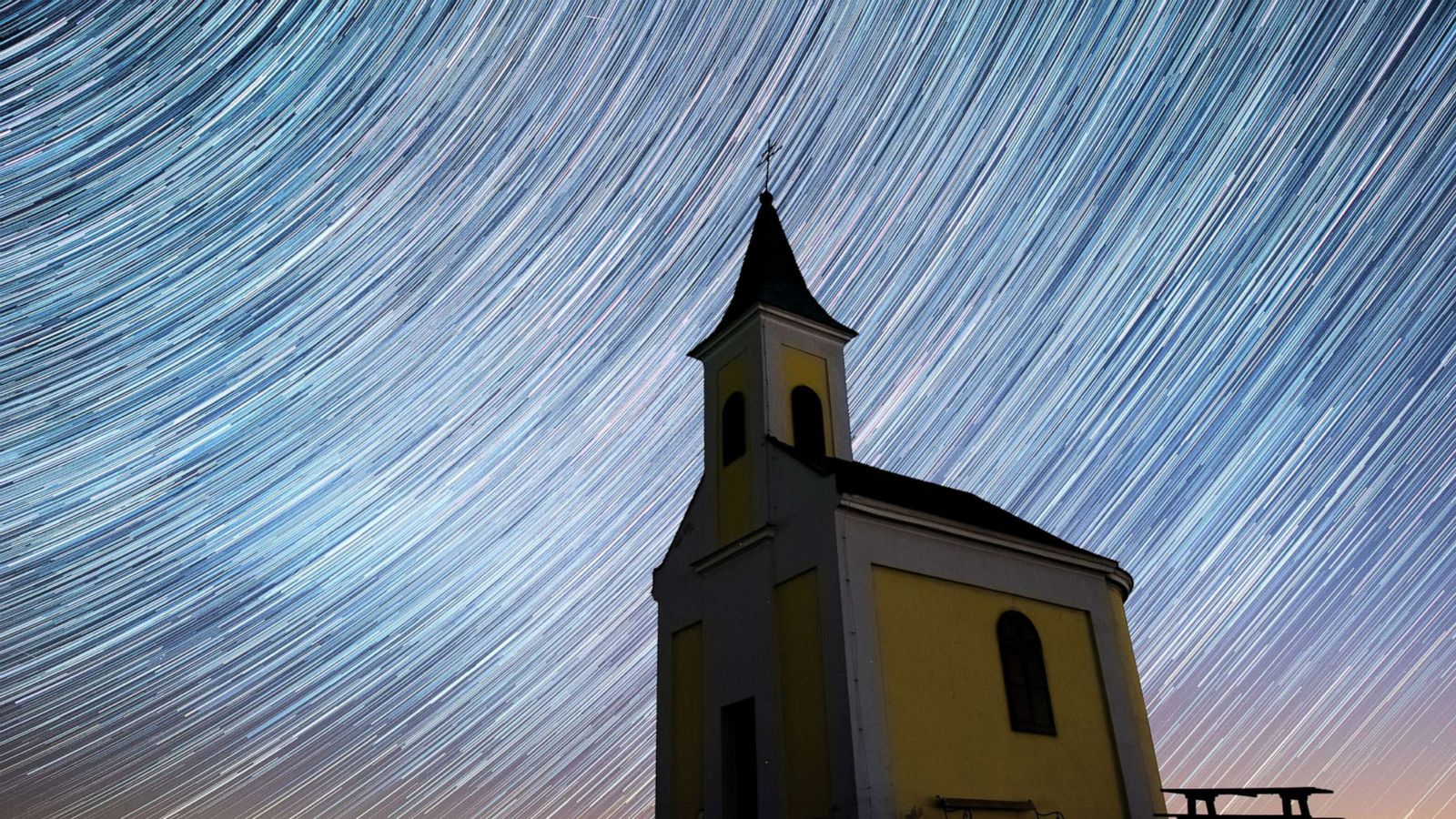 PHOTO: Startrails are seen during the Lyrids meteor shower over Michaelskapelle on April 20, 2020 in Niederhollabrunn, Austria.