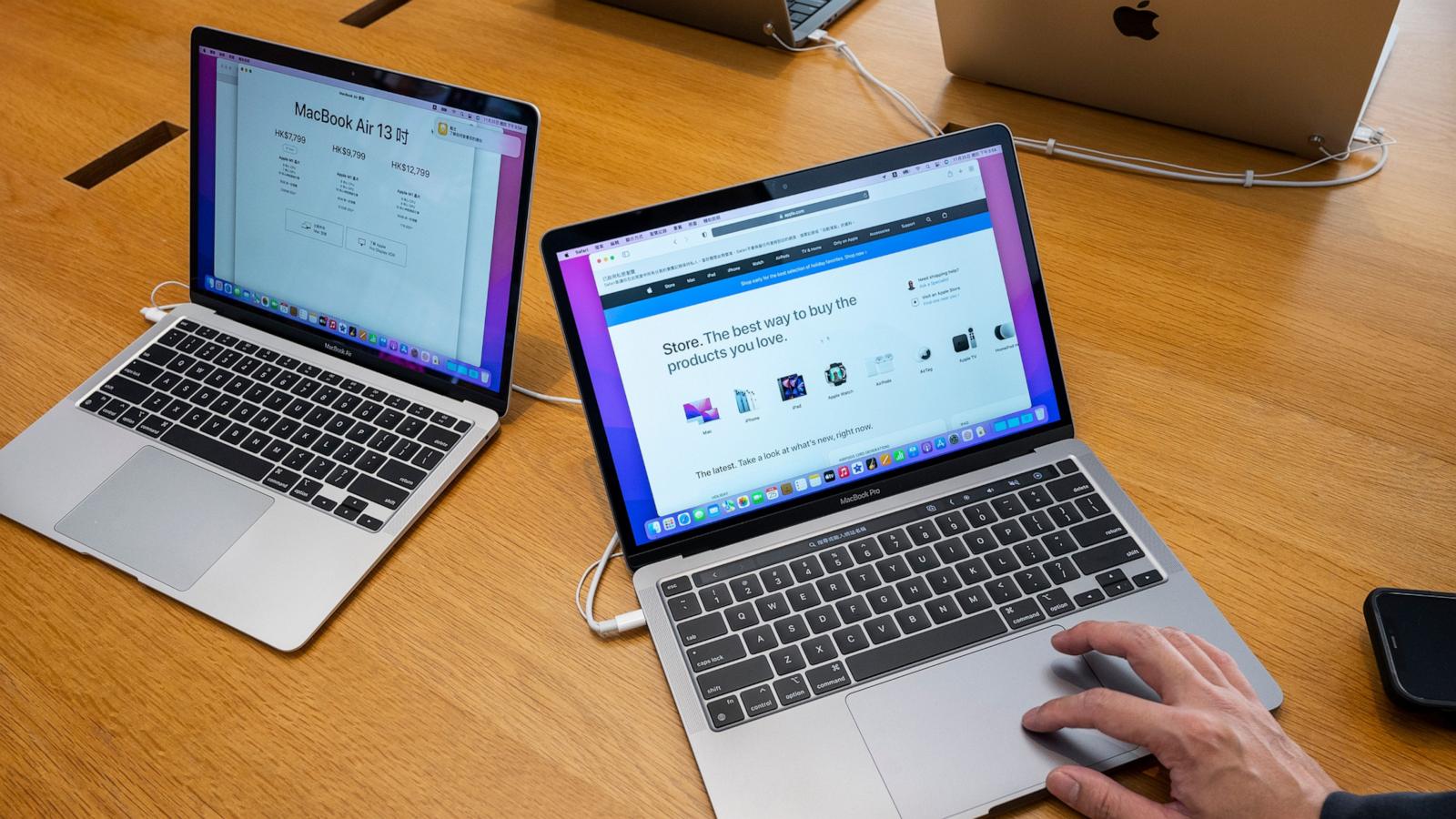 PHOTO: A shopper is seen using a Macbook Pro computer at an Apple store in Hong Kong, Nov. 29, 2021.