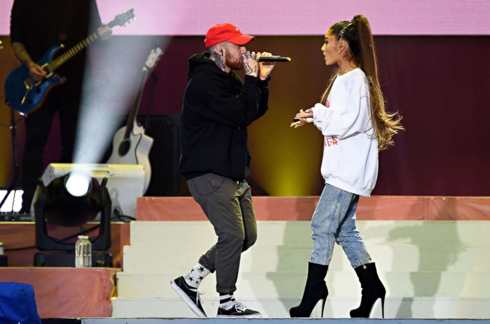 PHOTO: Mac Miller and Ariana Grande perform on stage, June 4, 2017, in Manchester, England for the "One Love Manchester" benefit concert. 